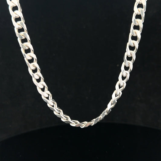 Silver curb chain weighing 48.8g, featuring classic links, perfect for jewelry design or wear.