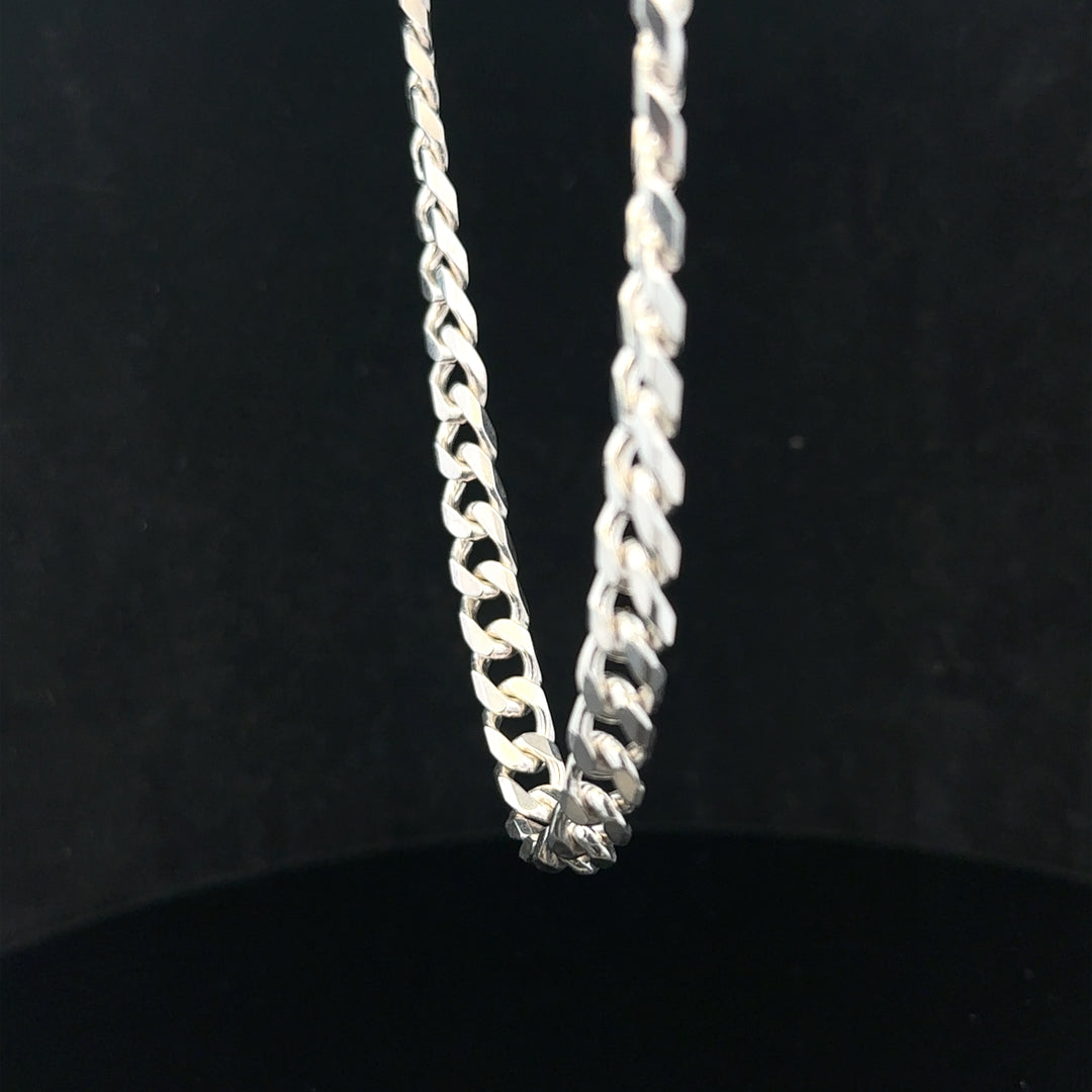 Silver curb chain weighing 48.8g, featuring classic links, made of unbranded durable metal for jewelry or accessories.