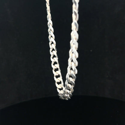 Silver curb chain weighing 48.8g, featuring classic links, made of unbranded durable metal for jewelry or accessories.