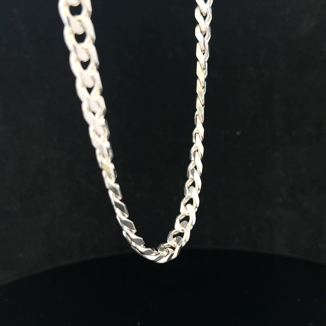 Silver curb chain weighing 48.8g with a sleek, interconnected link design, perfect for jewelry or accessories.