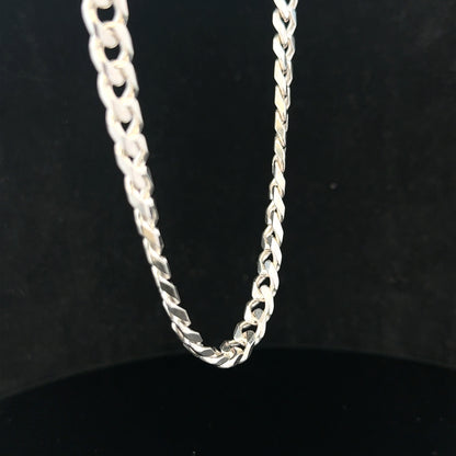 Silver curb chain weighing 48.8g with a sleek, interconnected link design, perfect for jewelry or accessories.