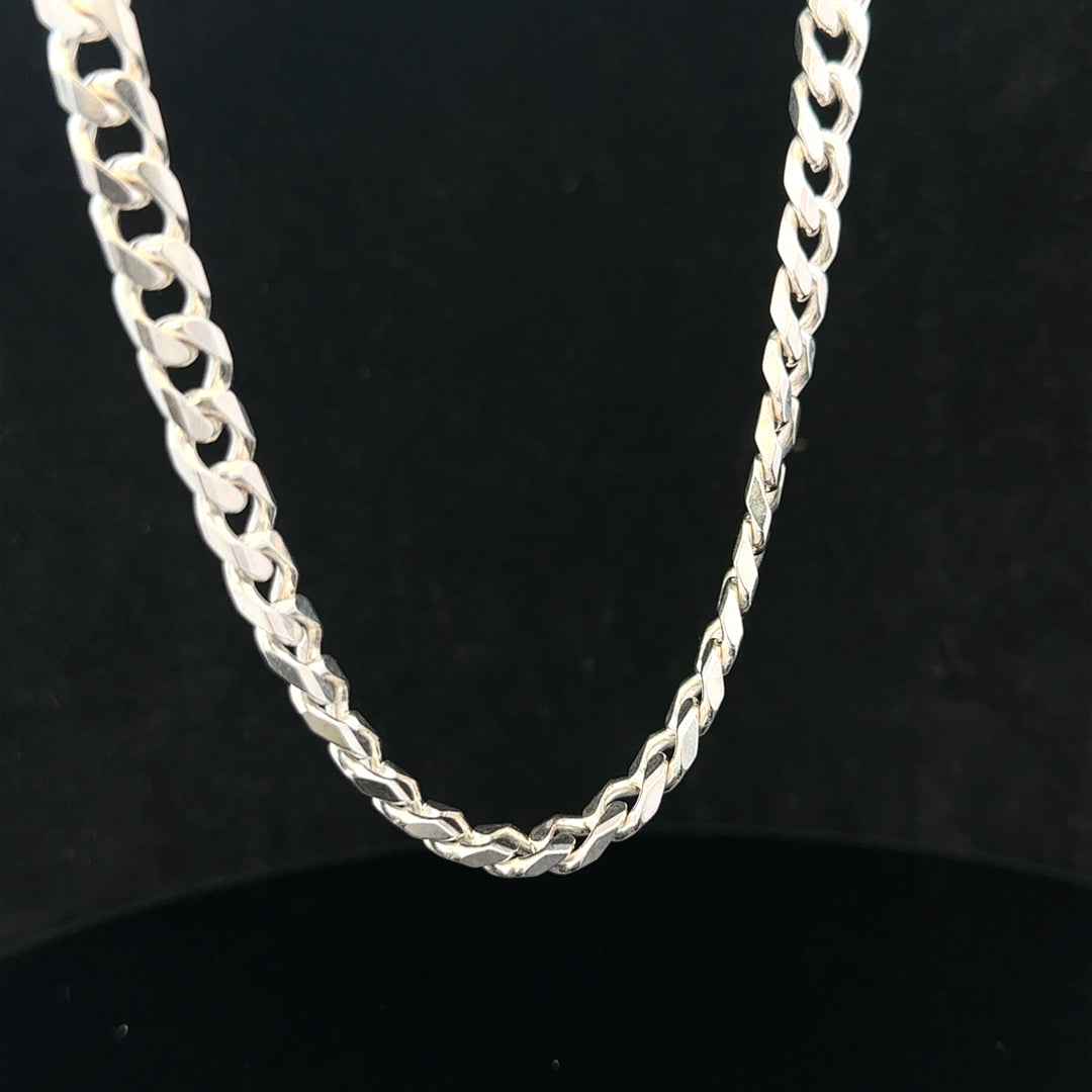 Silver curb chain weighing 48.8g, featuring a classic linked design, perfect for jewelry or accessory use.