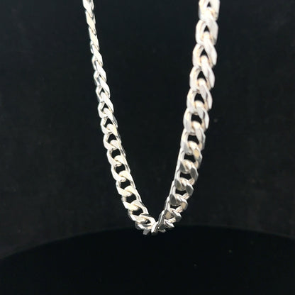 Silver curb chain weighing 48.8g, featuring a classic linked design, perfect for jewelry making or as a stylish accessory.