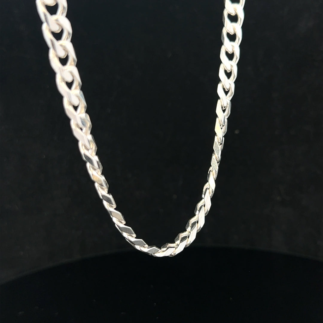 Silver curb chain weighing 48.8g, shown in close-up with detailed links, ideal for jewelry or accessory use.