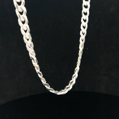 Silver curb chain weighing 48.8g, shown in close-up with detailed links, ideal for jewelry or accessory use.