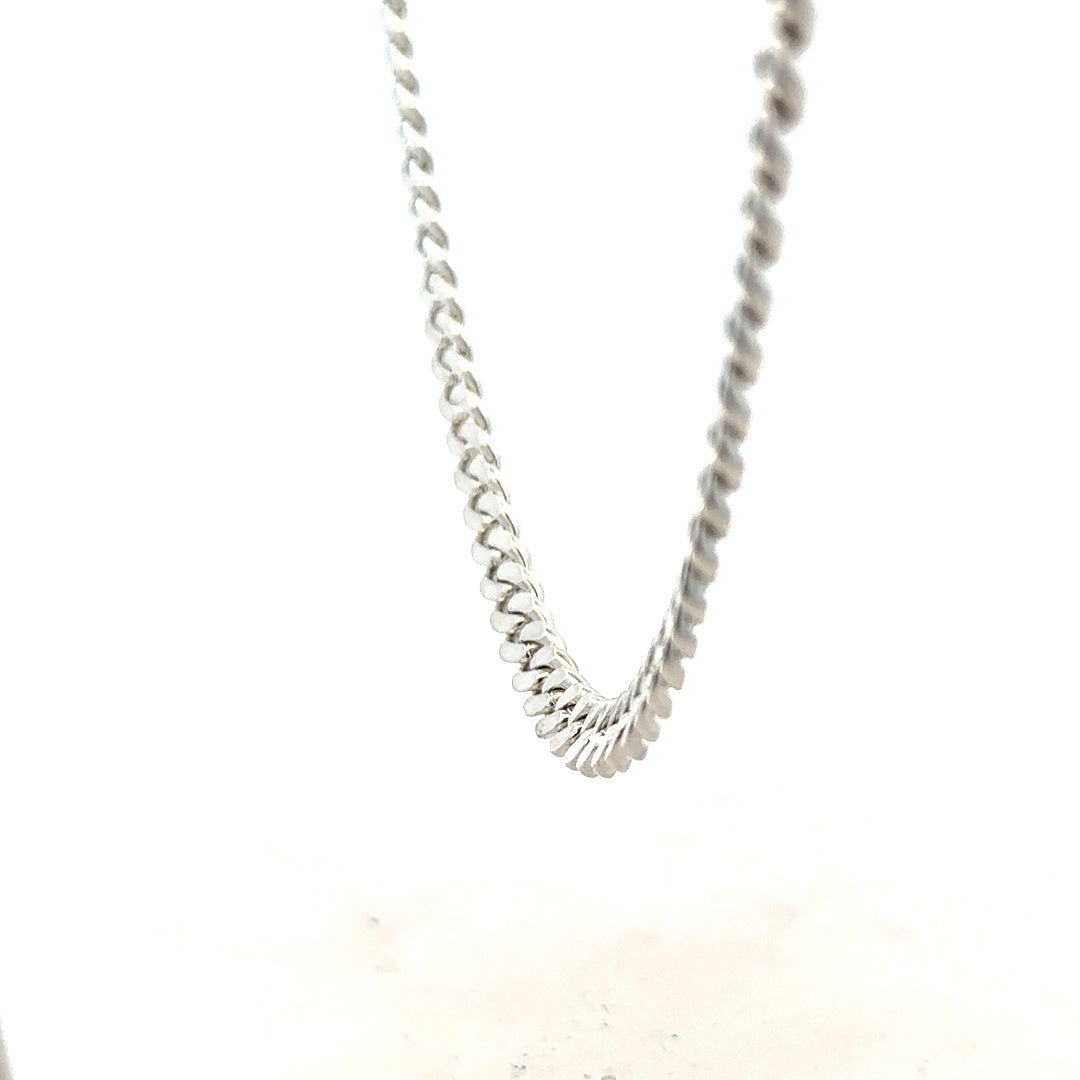 Silver curb chain weighing 51.8g with a polished finish, featuring interlocking links, unbranded jewelry accessory.