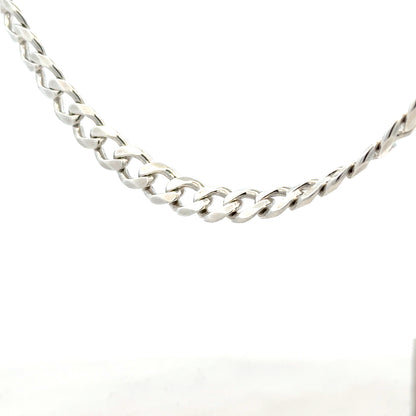 Silver curb chain weighing 59.3g with a sleek design, perfect for jewelry or accessories, unbranded.