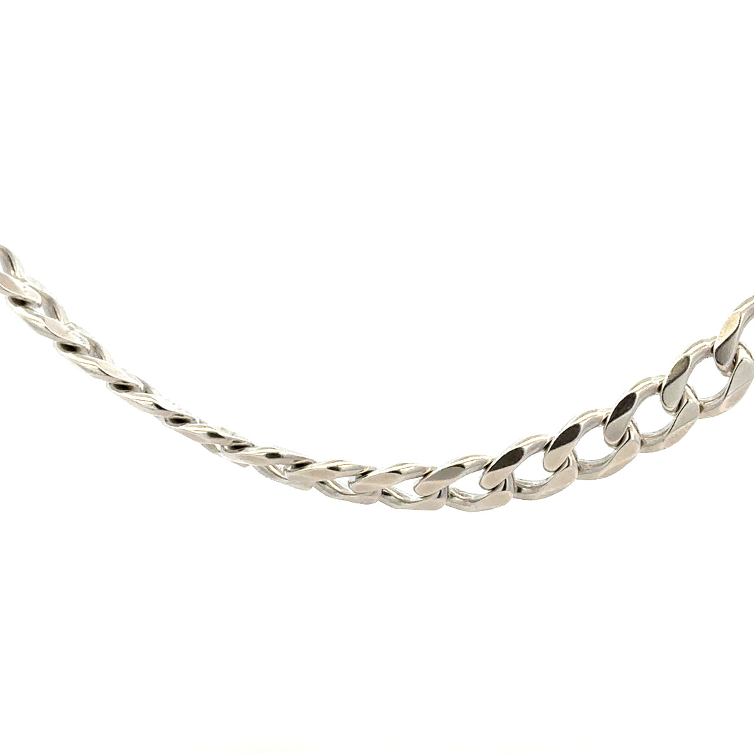 Silver curb chain weighing 59.3g, featuring a classic design with interlocking links, ideal for jewelry or accessories.
