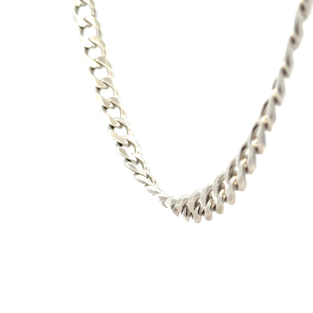 Silver curb chain weighing 59.3g, featuring a classic design with interlocking links, suitable for jewelry or accessories.