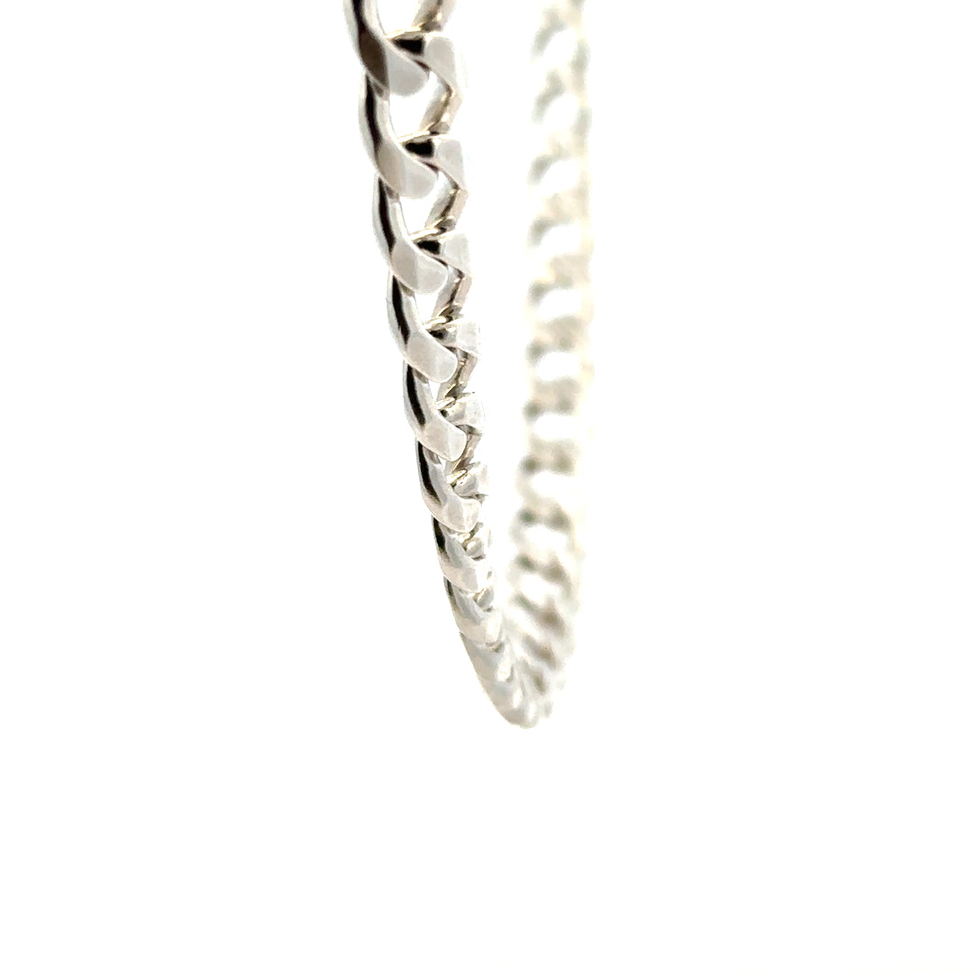 Silver curb chain weighing 59.3g, unbranded jewelry chain with a sleek, classic design.