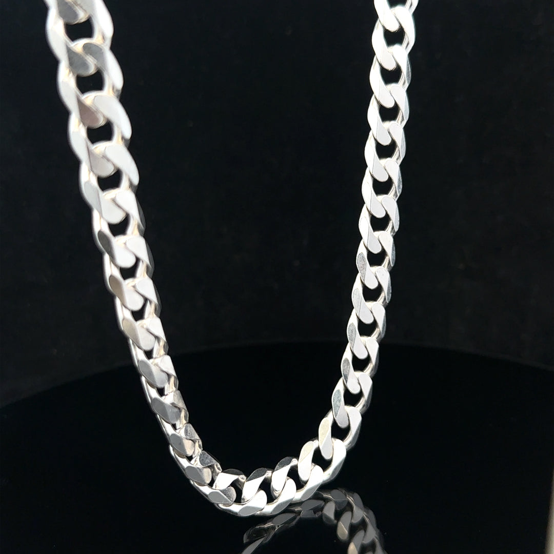 Silver curb chain weighing 60.4g with a sleek, polished design, showcasing a classic jewelry style and sturdy links.