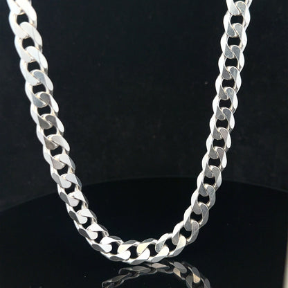 Silver curb chain weighing 60.4g, featuring interconnected flat oval links, displayed on a neutral background.