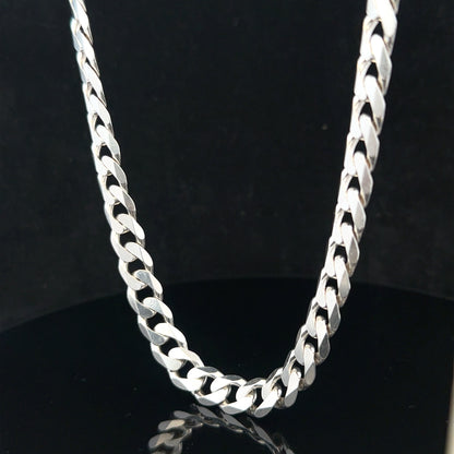 Silver curb chain weighing 60.4g, showcasing its polished links and durable design, ideal for jewelry or accessories.