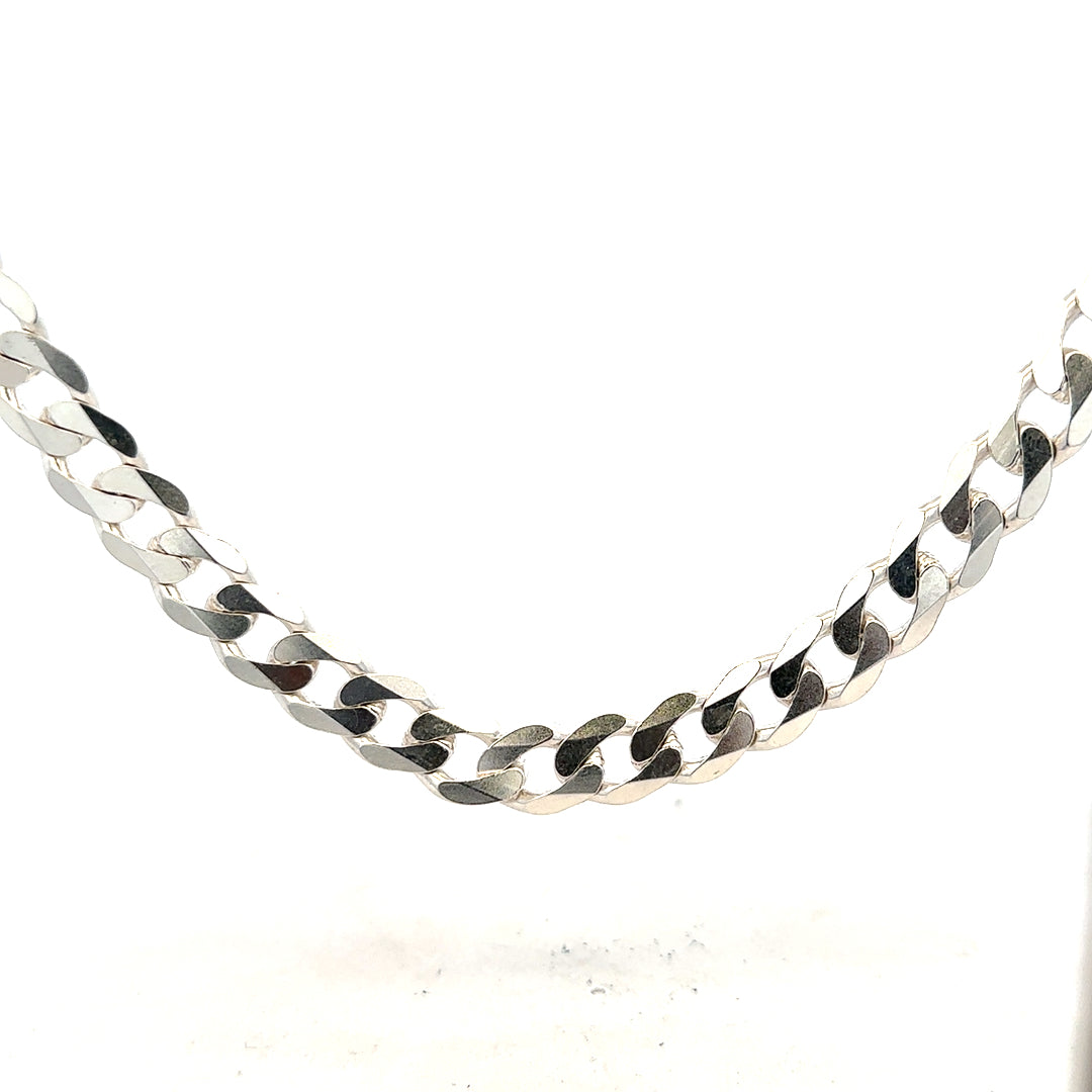 Silver curb chain weighing 60.8g, featuring a classic linked design, shown laid flat with a shiny finish.
