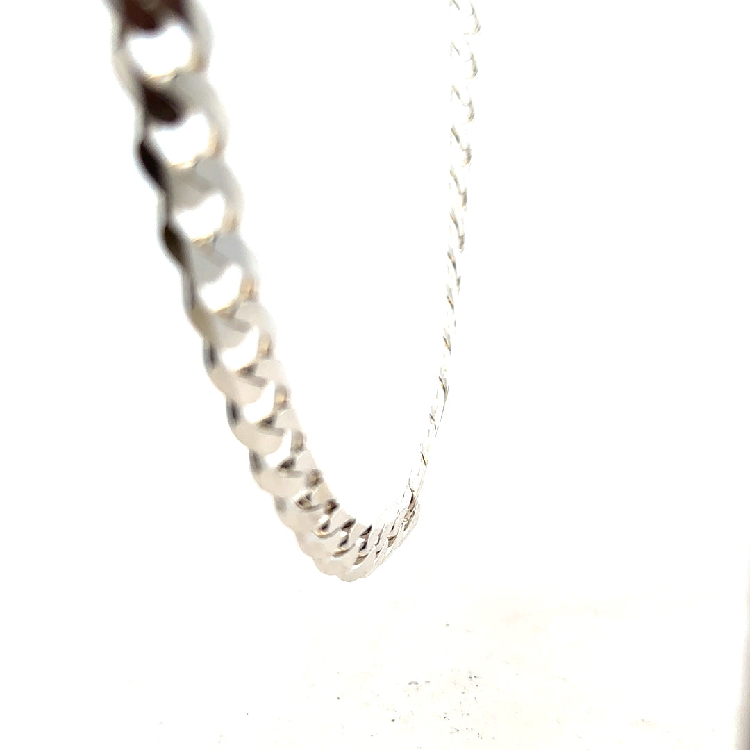 Silver curb chain weighing 60.8g with a classic design, displayed in a natural pose on a plain background.