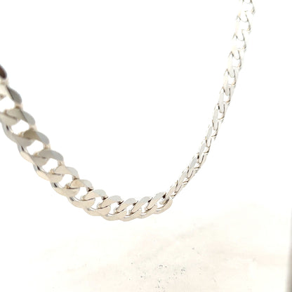 Silver curb chain weighing 60.8g with a sleek, classic design, perfect for jewelry or accessories.