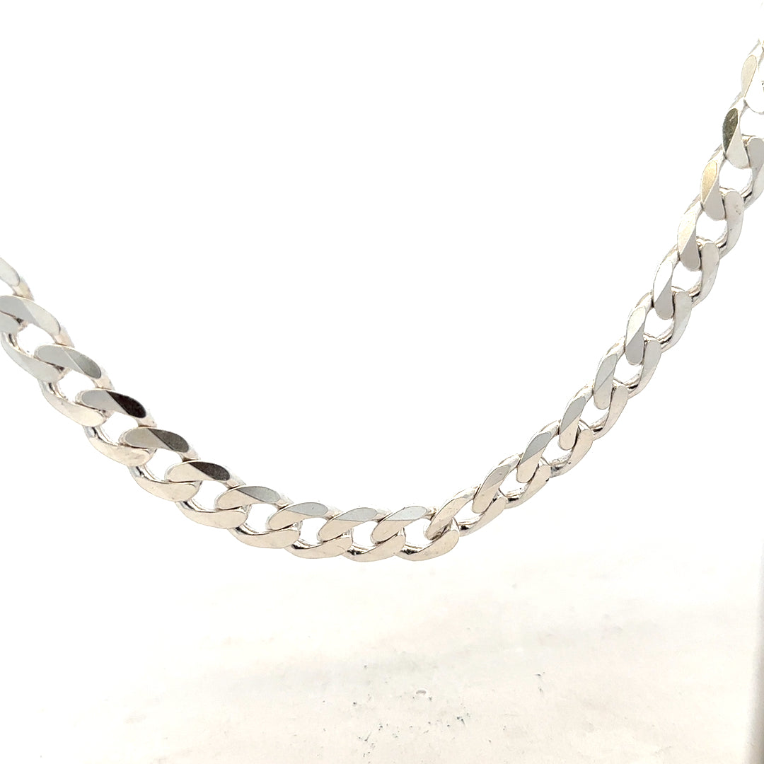 Silver curb chain weighing 60.8g with a smooth, linked design, ideal for jewelry and accessories.