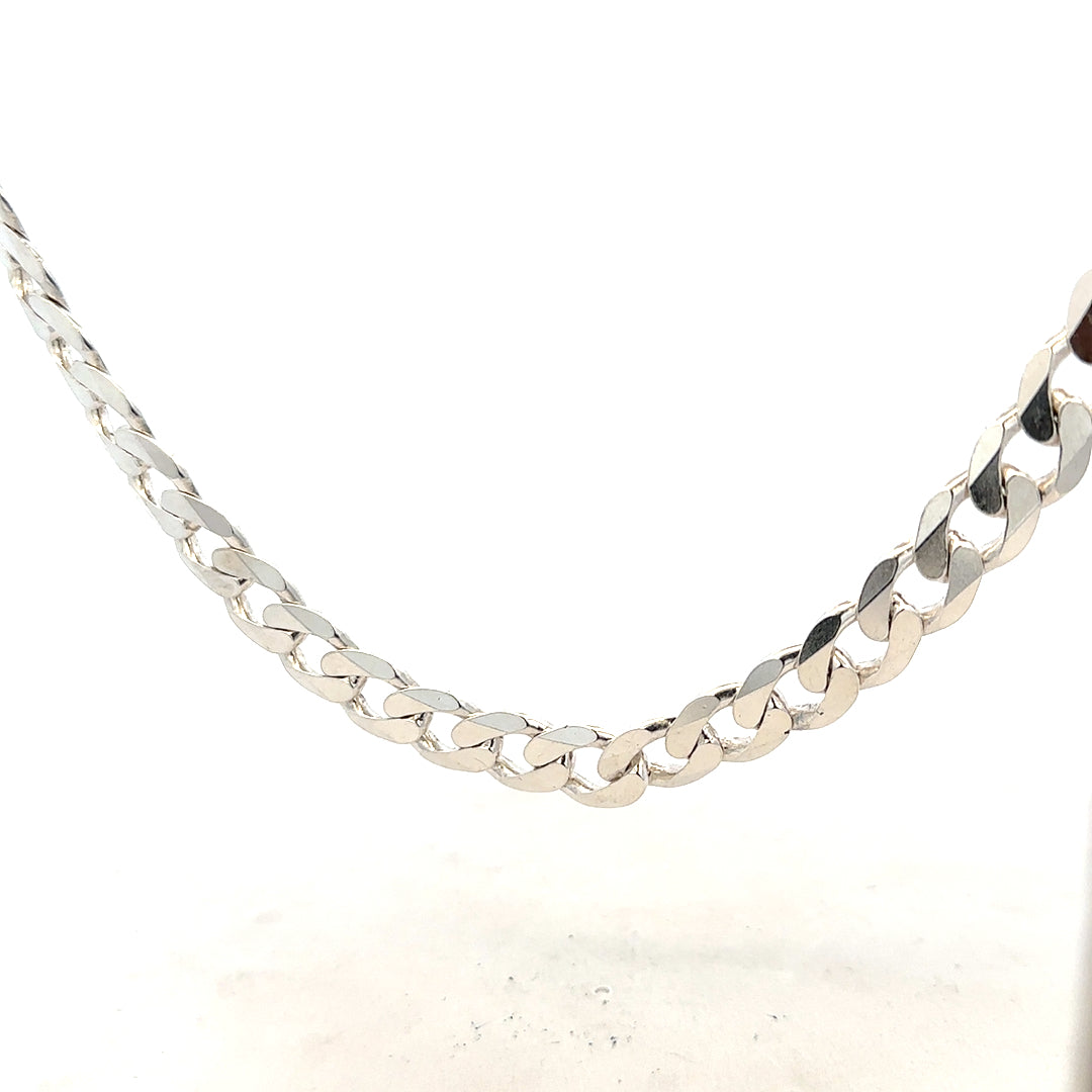 Silver curb chain weighing 60.8g, featuring interlocked oval links, crafted with a sleek and polished finish.