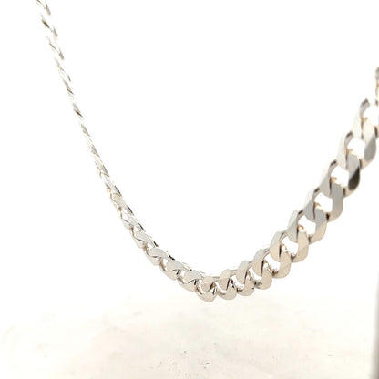 Silver curb chain weighing 60.8g, featuring interconnected oval links, shown in a close-up image.