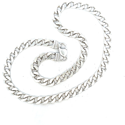 Silver curb chain weighing 63.4g, featuring a classic design and polished finish, displayed against a neutral background.