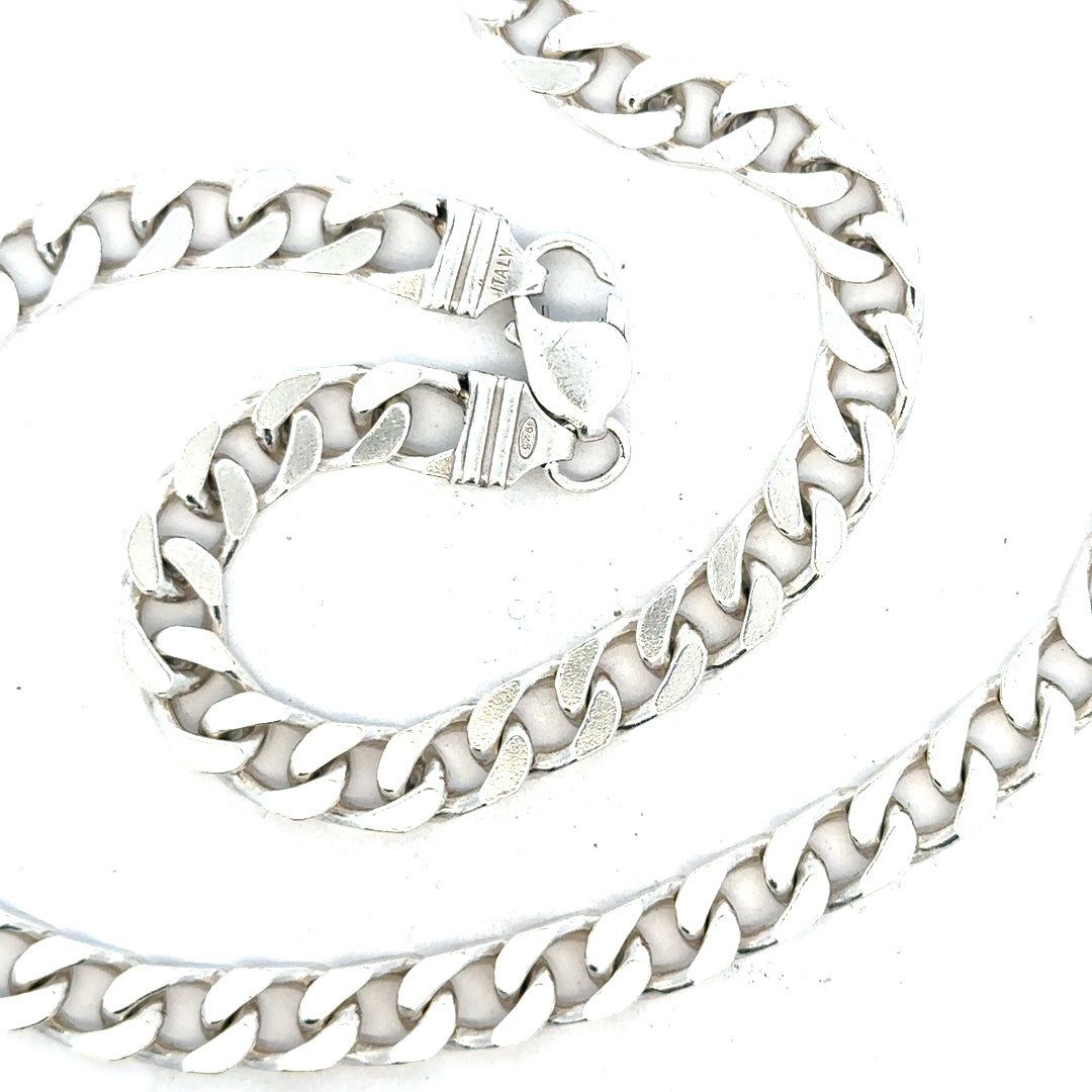 Silver curb chain weighing 63.4g, unbranded jewelry chain with a classic curb link design.