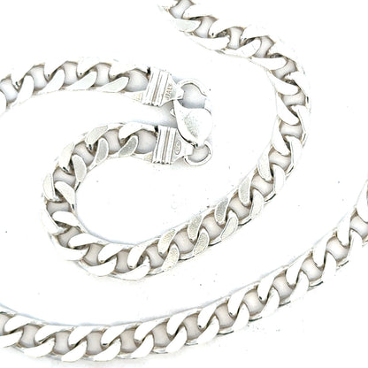 Silver curb chain weighing 63.4g, unbranded jewelry chain with a classic curb link design.