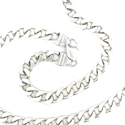 Silver curb chain weighing 63.4g, featuring sturdy links and a polished finish, ideal for jewelry or accessories.