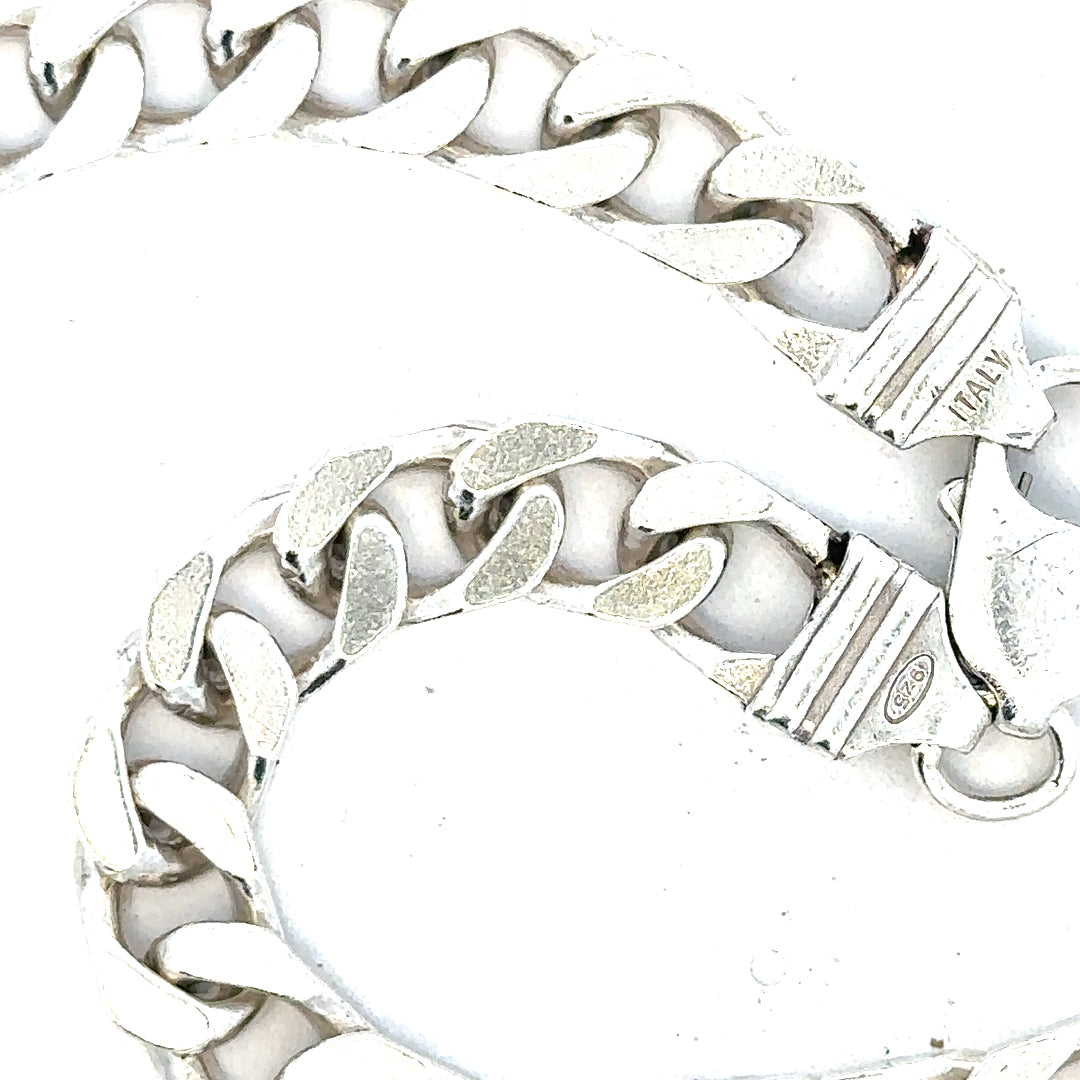 Silver curb chain weighing 63.4g with a sleek, polished finish, designed for stylish jewelry or accessory use.
