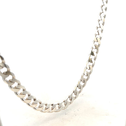 Silver curb chain weighing 66.7g with a polished finish, featuring a classic link design, perfect for jewelry or accessories.