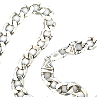 Silver curb chain weighing 80.2g with a classic style, featuring interlocking links, ideal for jewelry or fashion accessories.