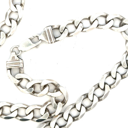 Silver curb chain jewelry, 80.2g, with thick links, showcasing a shiny finish and sturdy design.