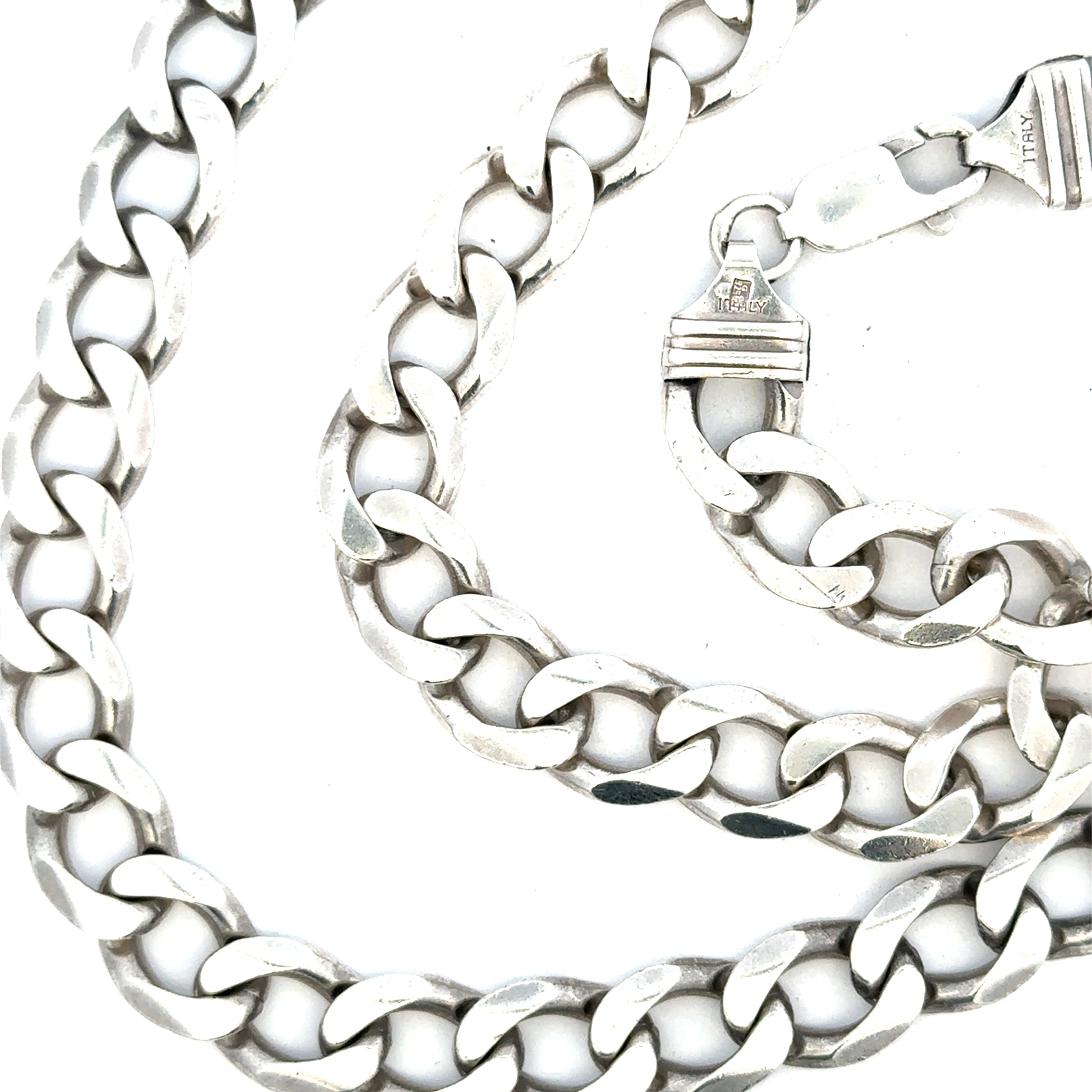 Silver curb chain weighing 80.2g, featuring interconnected flat links, designed for jewelry or accessories.