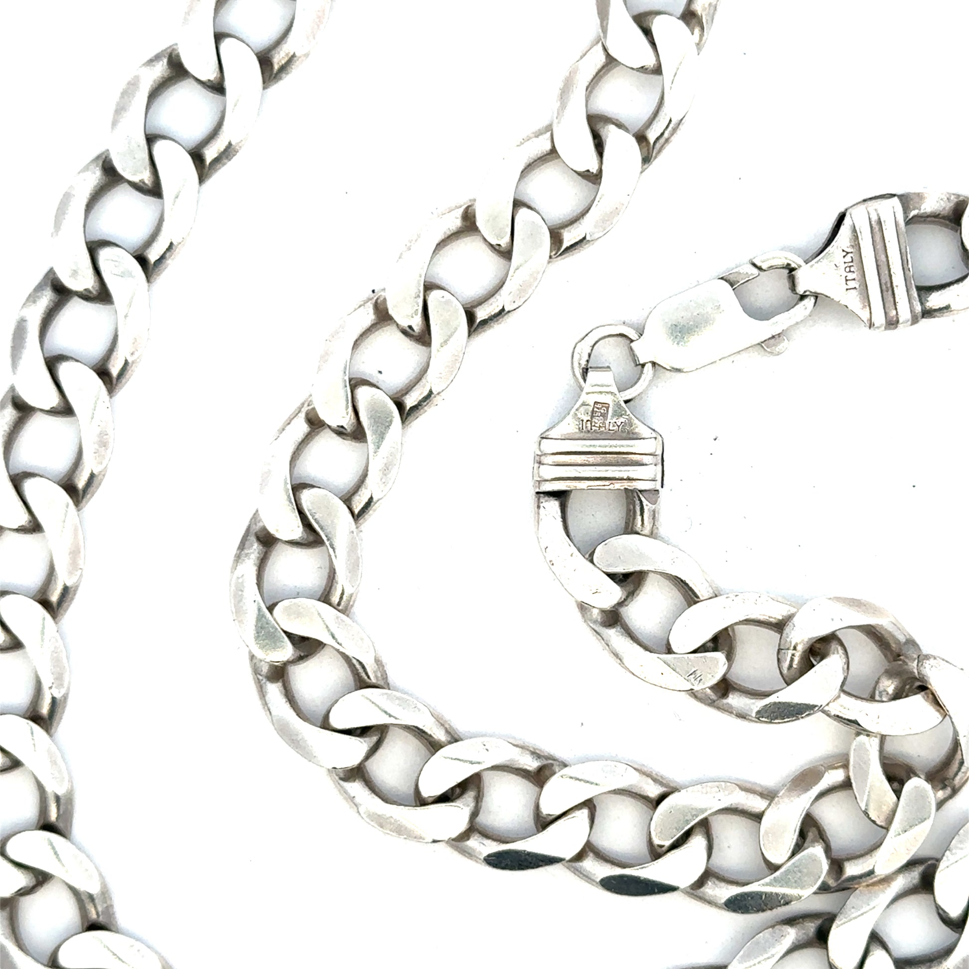 Silver curb chain weighing 80.2g with a classic design, crafted for durability and style, shown in a detailed close-up image.