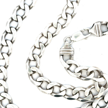 Silver curb chain weighing 80.2g with a classic design, crafted for durability and style, shown in a detailed close-up image.