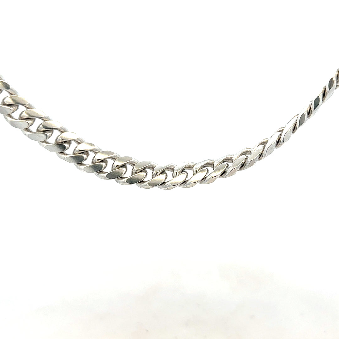 Silver curb chain weighing 81.2g, featuring a classic design with interlocking links, perfect for jewelry or accessories.
