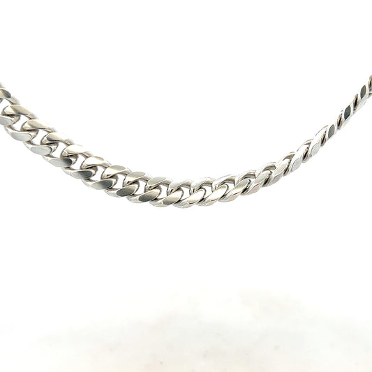 Silver curb chain weighing 81.2g, featuring a classic design with interlocking links, perfect for jewelry or accessories.