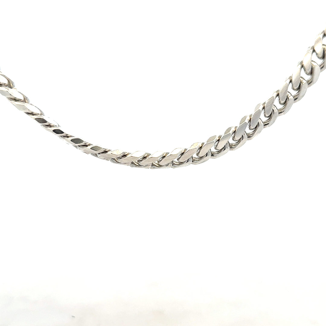 Silver curb chain weighing 81.2g, unbranded jewelry chain with linked oval-shaped silver links, close-up view.