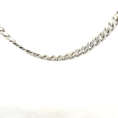 Silver curb chain weighing 81.2g, unbranded jewelry chain with linked oval-shaped silver links, close-up view.