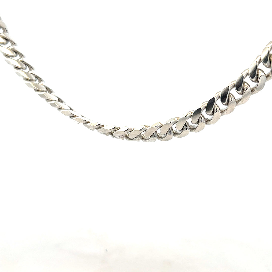 Silver curb chain jewelry with a shiny finish, weighing 81.2 grams, showcasing its detailed links and craftsmanship.