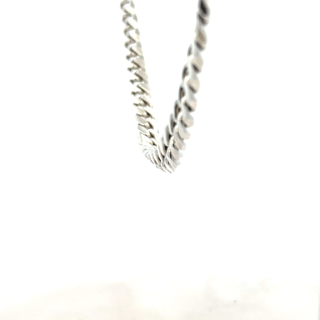Silver curb chain weighing 81.2g, featuring a classic design with interlocking links, suitable for jewelry or accessories.