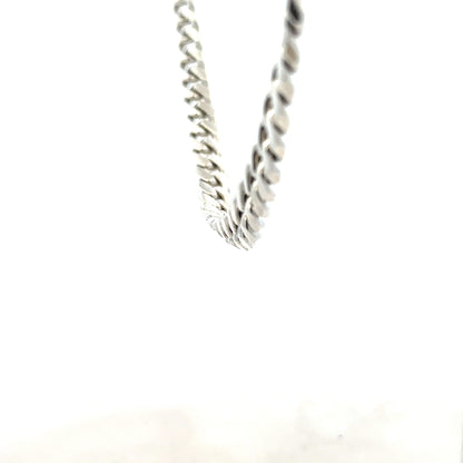 Silver curb chain weighing 81.2g, featuring a classic design with interlocking links, suitable for jewelry or accessories.