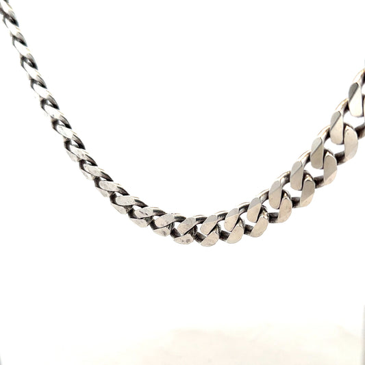 Silver curb chain weighing 91.1g, featuring a classic unbranded jewelry design with interlocking links.