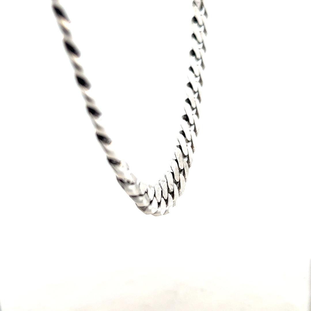 Silver curb chain weighing 91.1g, displayed on a plain background, showcasing its durable, classic jewelry style.