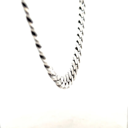 Silver curb chain weighing 91.1g, displayed on a plain background, showcasing its durable, classic jewelry style.