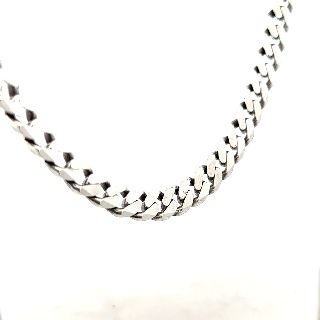 Silver curb chain weighing 91.1g, featuring a classic link design, shown in a close-up image of this unbranded jewelry piece.
