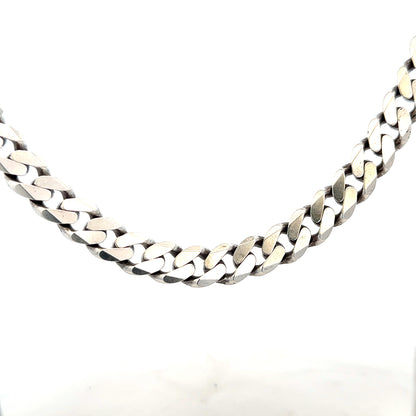 Silver curb chain weighing 91.1g, showcasing its shiny, linked design and sturdy construction.