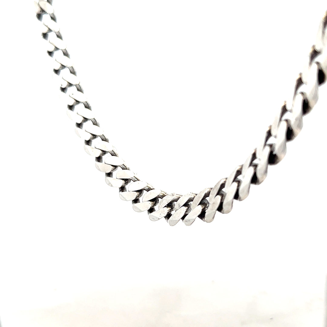 Silver curb chain weighing 91.1g, showcasing a polished jewelry link chain with a sleek, classic design.