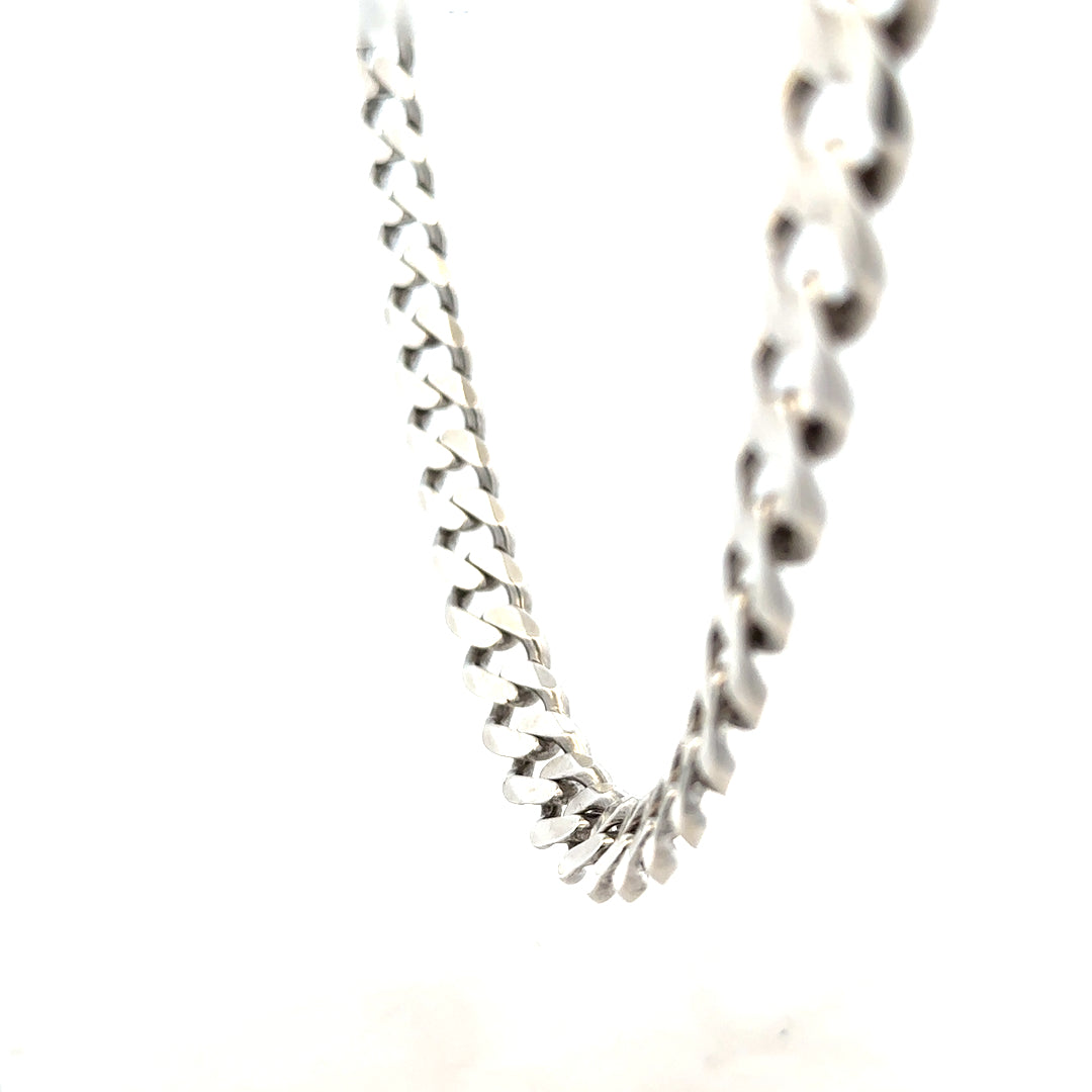 Silver curb chain weighing 94.7g, unbranded, featuring interlocking oval links, displayed on a neutral background.