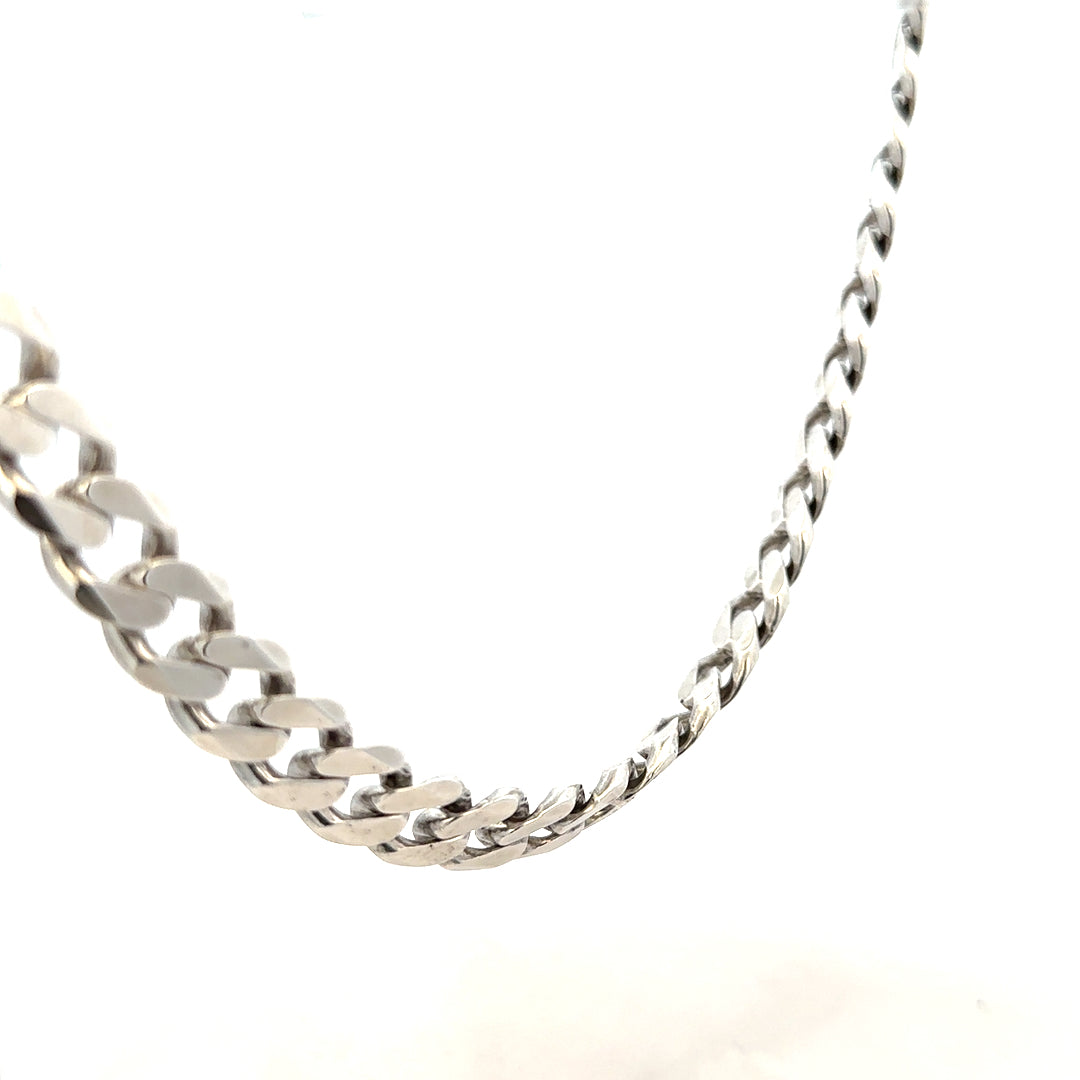 Silver curb chain jewelry weighing 94.7g with a classic design, displayed on a neutral background.
