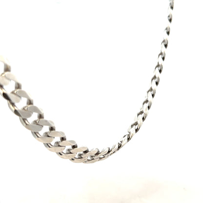 Silver curb chain jewelry weighing 94.7g with a classic design, displayed on a neutral background.